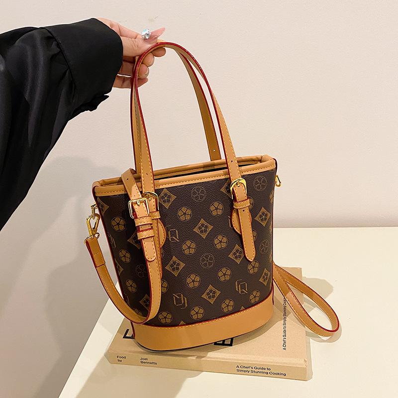 Bucket bag women's new retro simple niche high-end women's handbag diagonal span small women's bag