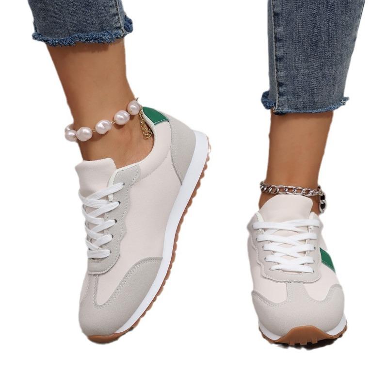 Autumn and winter new large size fashion casual temperament flat bottom lace-up color matching outside casual shoes women