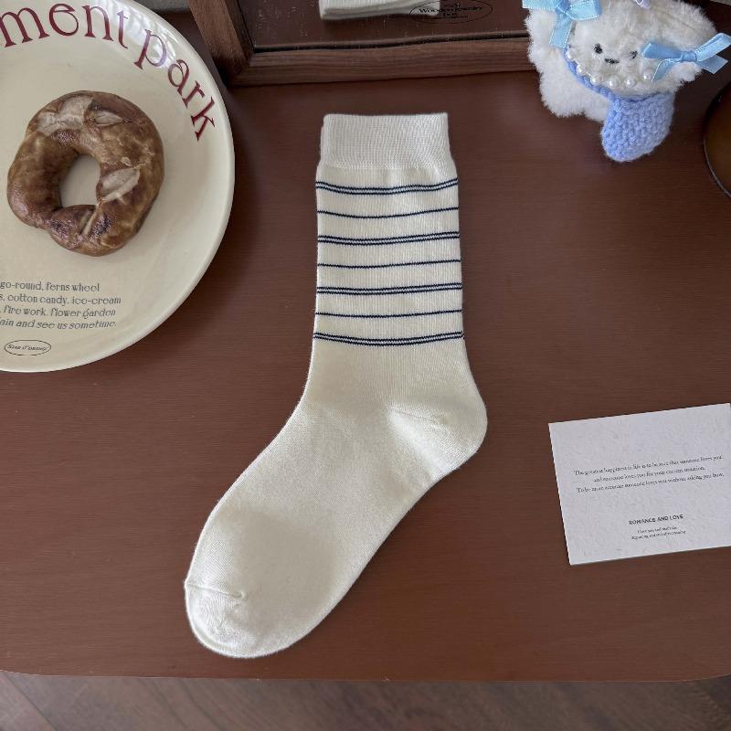 Fall/Winter Children's Socks From Fel Island, Retro Dark Blue School-style Pile Socks with Buttoned and Bow-tied Cuffs.