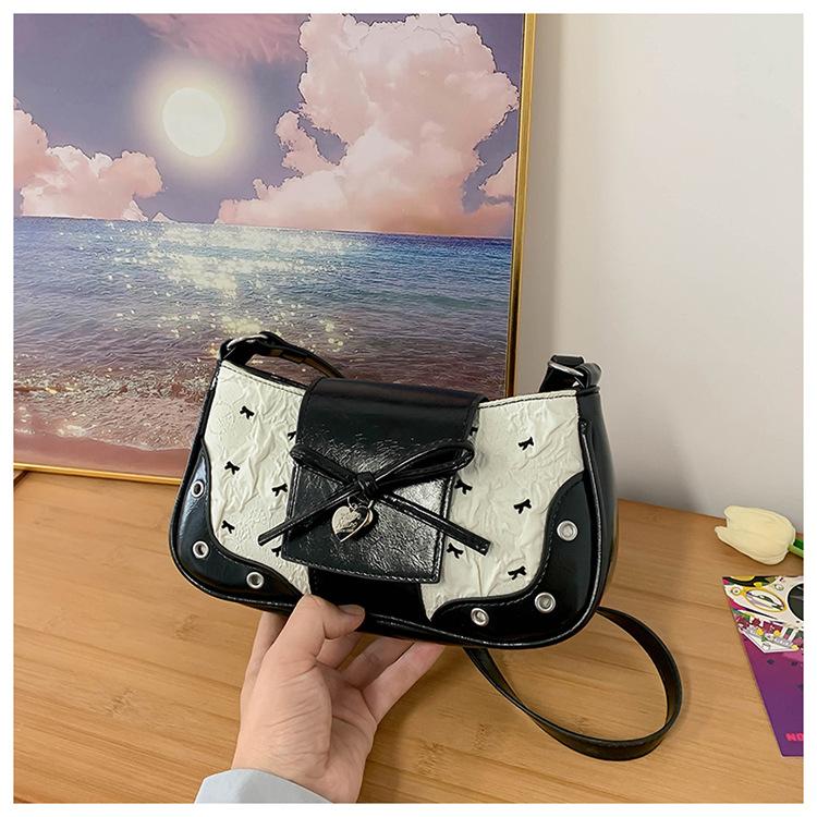 

Ретро корейская версия нишевая дизайнерская сумка 2025 лето новая трендовая сумка через плечо простая и универсальная повседневная сумка-мессенджер