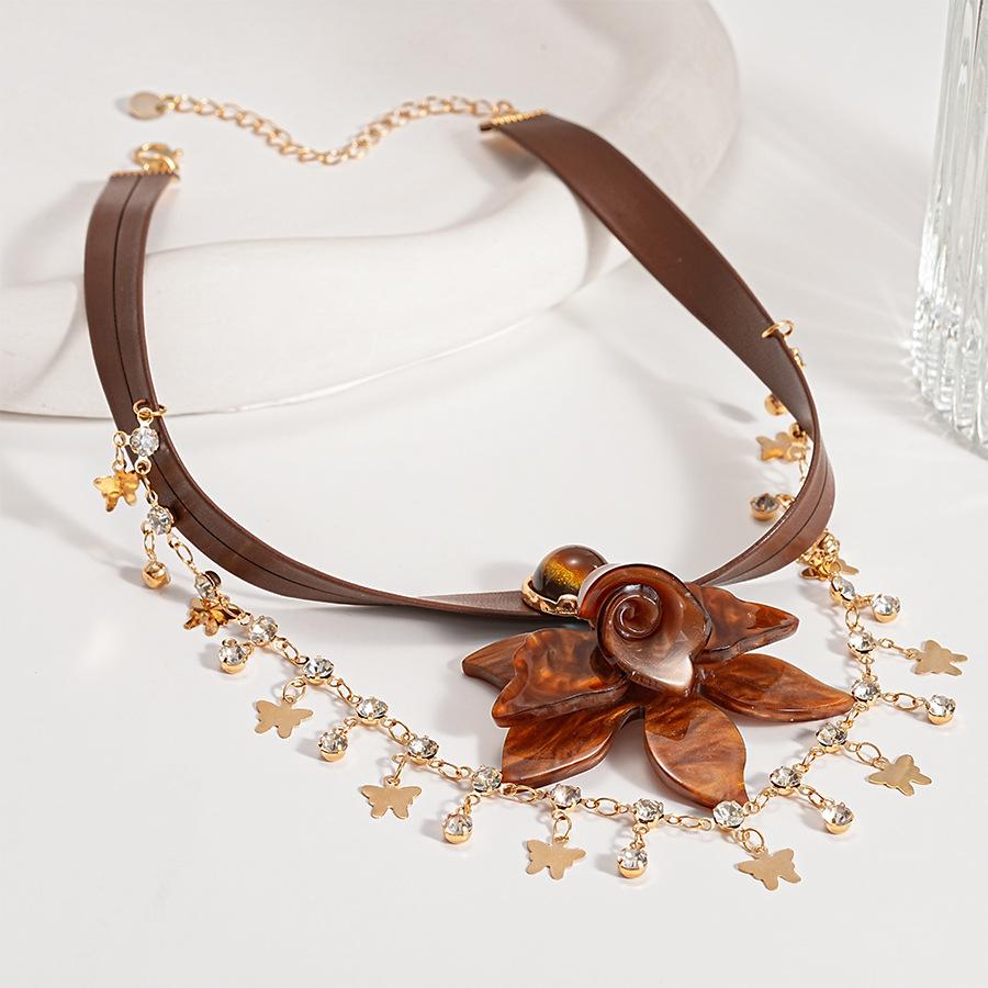 

Vintage diamond-set leather resin tiger s eye stone flower butterfly collarbone necklace niche high-end item jewelry