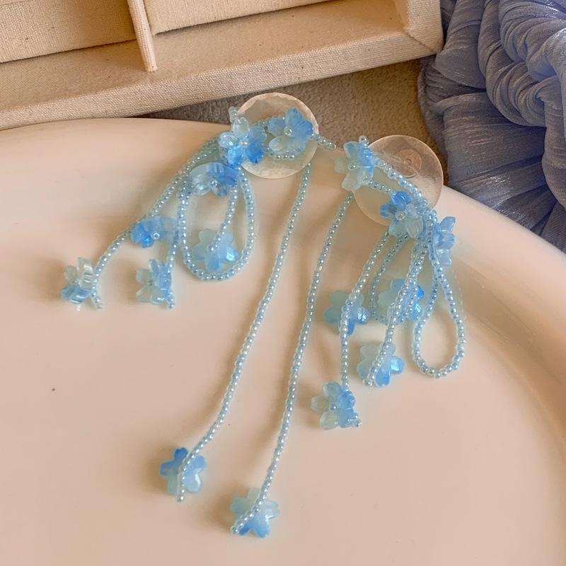 2026 New Spring Dream Orchid Tassel Earrings – Resort Style, Sweet Floral Design, Versatile High-End Studs for Women.