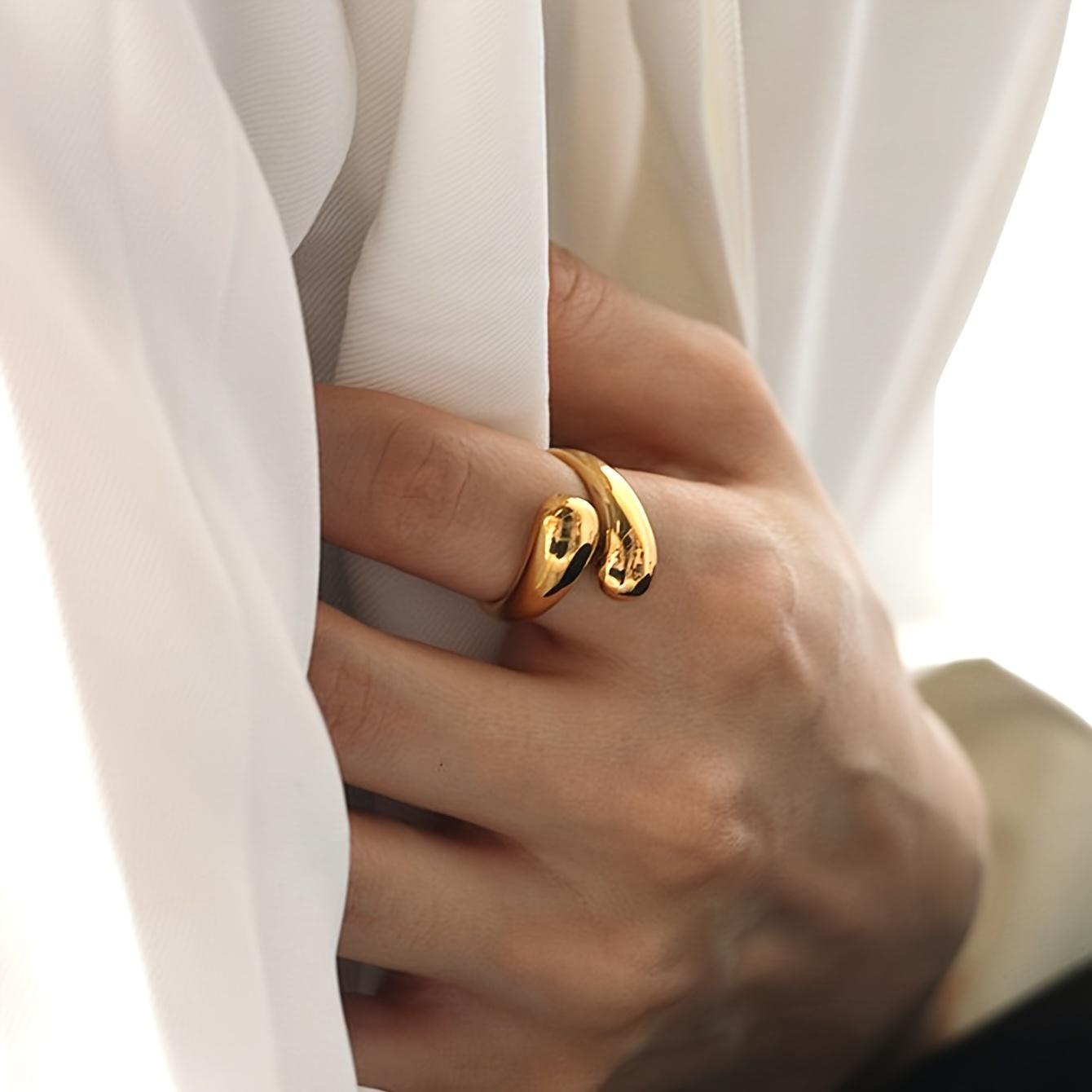 

Стильное кольцо-обруч в форме капли воды — массивное, регулируемое, унисекс-дизайн для повседневных образов и вечеринок, подходит как мужчинам, так и женщинам, удобно носить Female