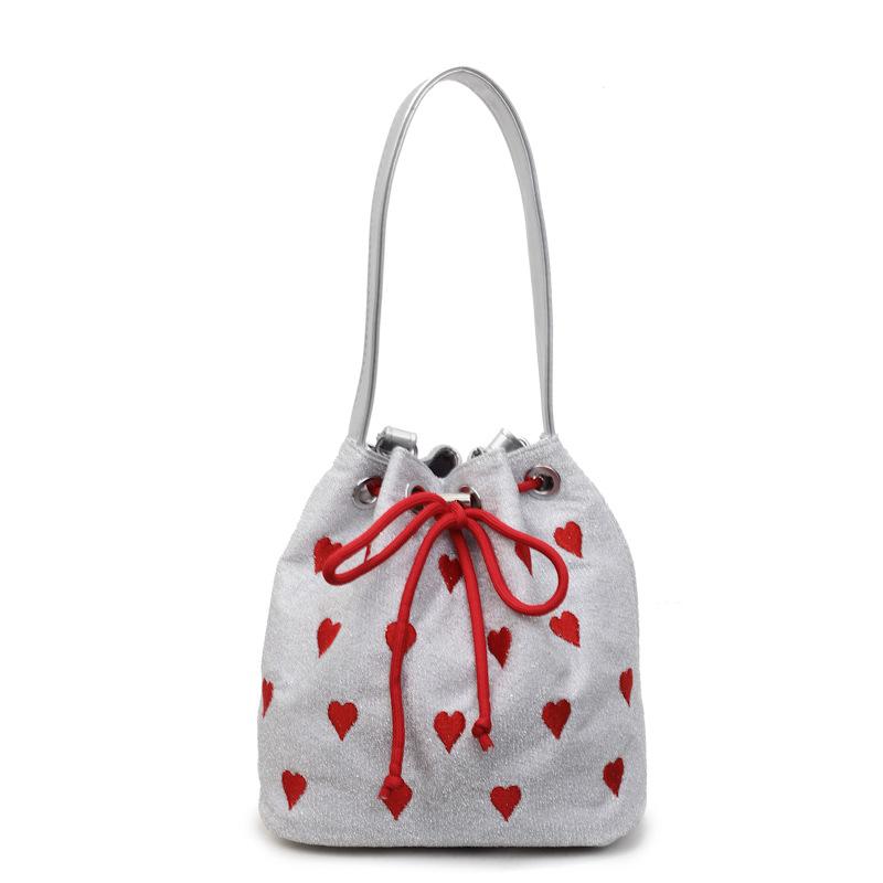 

Bag women s bag 2025 new Korean version fashion embroidery thread love bucket bag portable strap contrasting color messenger bag срібний