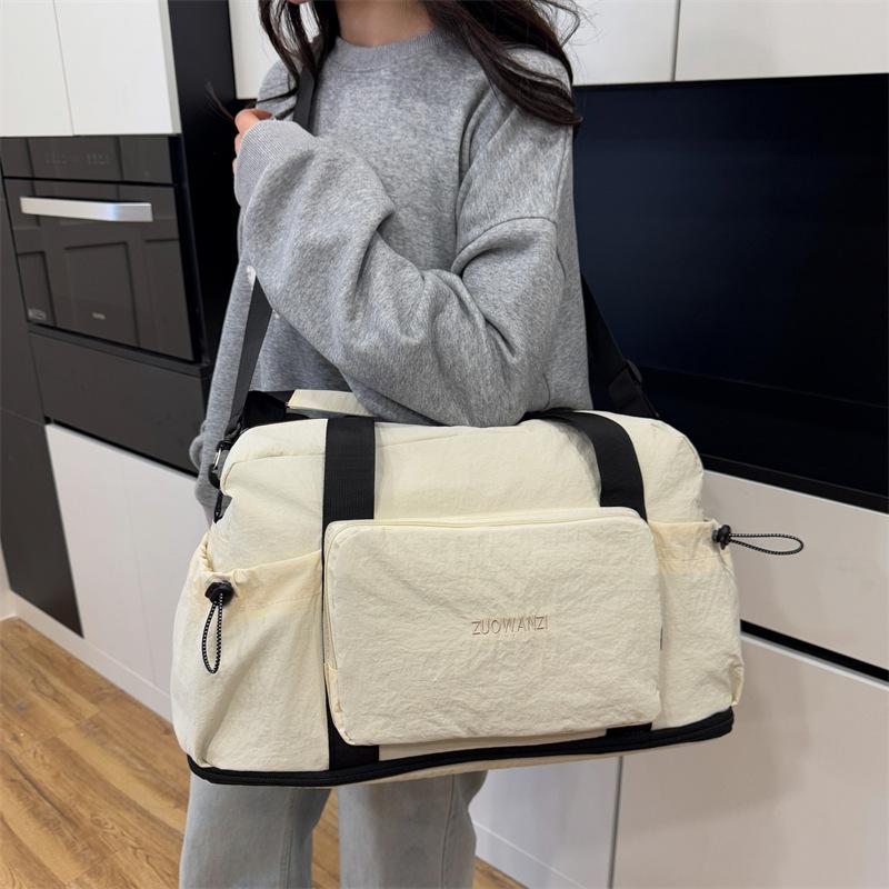 Foldable gym bag with dry and wet separation, expandable travel handbag, single shoulder crossbody travel bag, sports gym bag