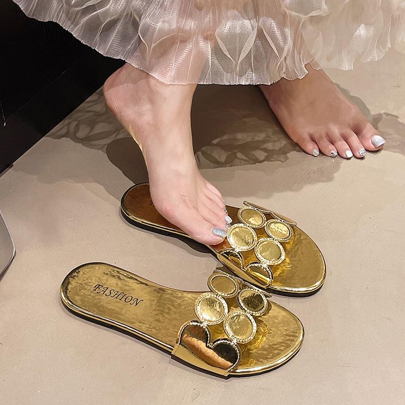 

Super soft one-character cool slippers for women s 2025 summer new round head low-heeled shoes hollowed-out flowers and half slippers 43 золотой