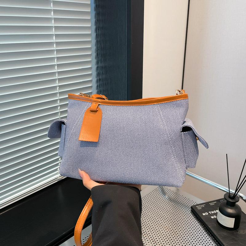 

Spring and summer new niche bags, commuter armpit bags, fashionable and versatile women s casual shoulder messenger bags синій