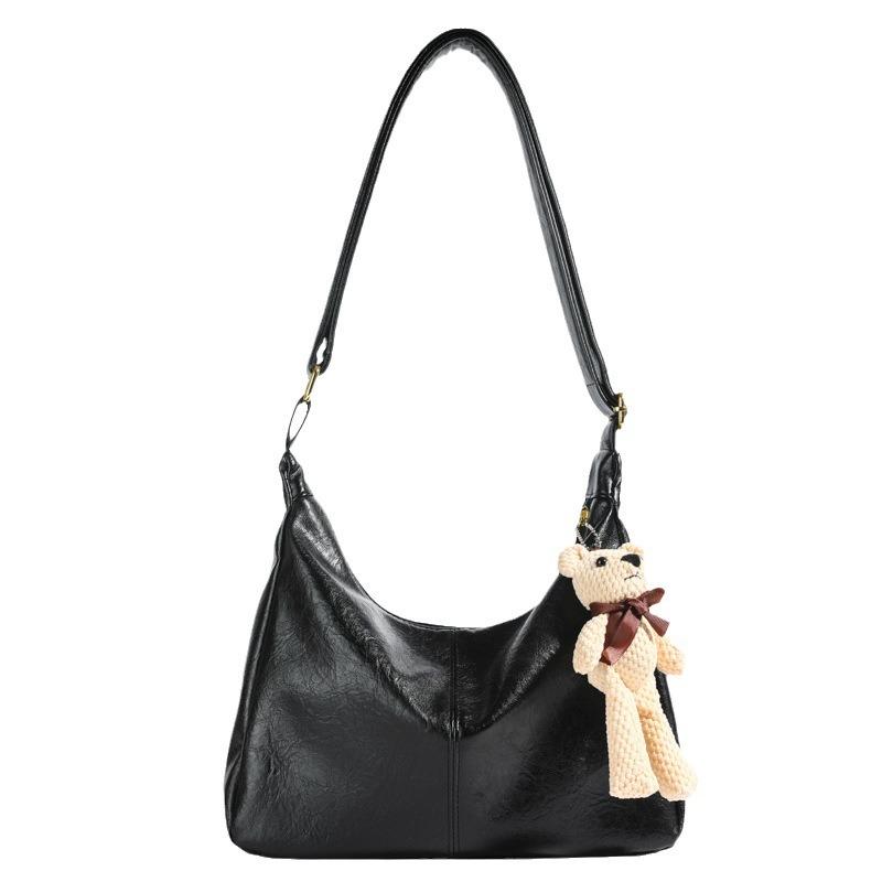 Lättvindig nischig dumplingväska dam höst och vinter retro textur pendlarväska personlig mjuk läder axelväska