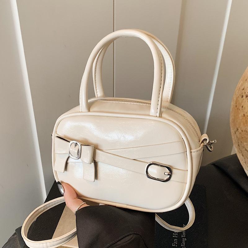 This year, Korean niche design sense, portable bowling bag, versatile high-end sense, foreign style fashion messenger women's bag