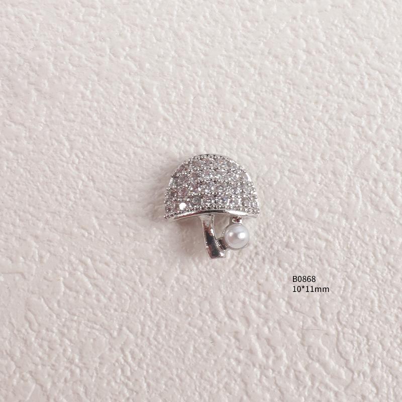 Trendiger Strass- und Zirkon-Nagelschmuck mit diamantbesetzten Metallpailletten