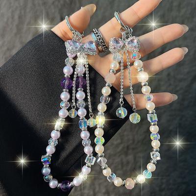 Lehký luxusní řetízek na telefon s mašlí z kamínků Červený řemínek na telefon s třásněmi Křišťálový řetízek do ruky Všestranný doplněk