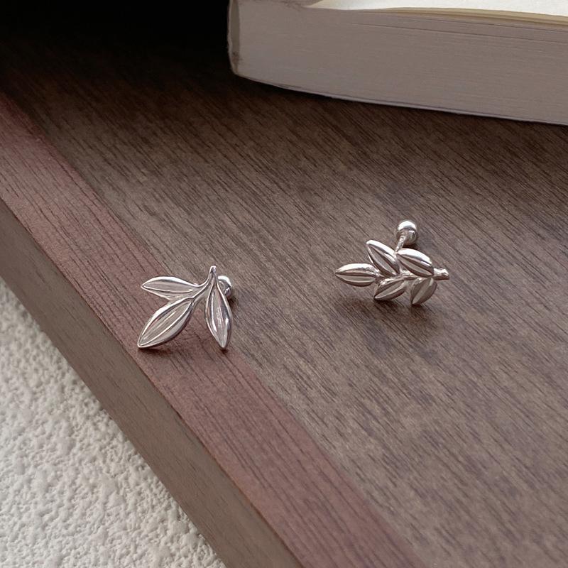 Elegant 999 Sterling Silver Asymmetrical Leaf Stud Earrings for Women - Simple, Versatile Design with Screw-Back Closure