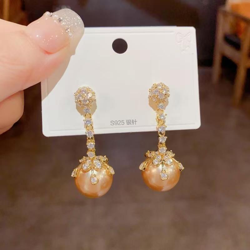 Korean version champagne pearl earrings, snowflake earrings, long temperament, high-end light luxury earrings, earrings.