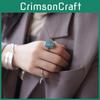 Eleganter geometrischer Kupferring mit verstellbarem Design und trendigem Falkenfeder-Element