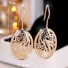 Vintage Gold Farbe Aushöhlen Blume Muster Tropfen Ohrringe für Frauen Mode Schmuck Party Geschenk