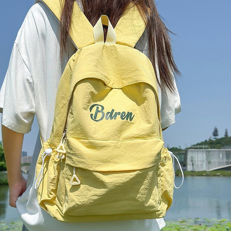 The new schoolbag is high-value, fresh and sweet, candy-colored backpack, lightweight and large-capacity backpack for junior high school students.