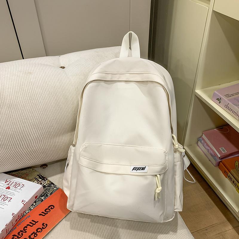 Simple casual large-capacity backpack women's new junior high school high school student schoolbag versatile travel backpack