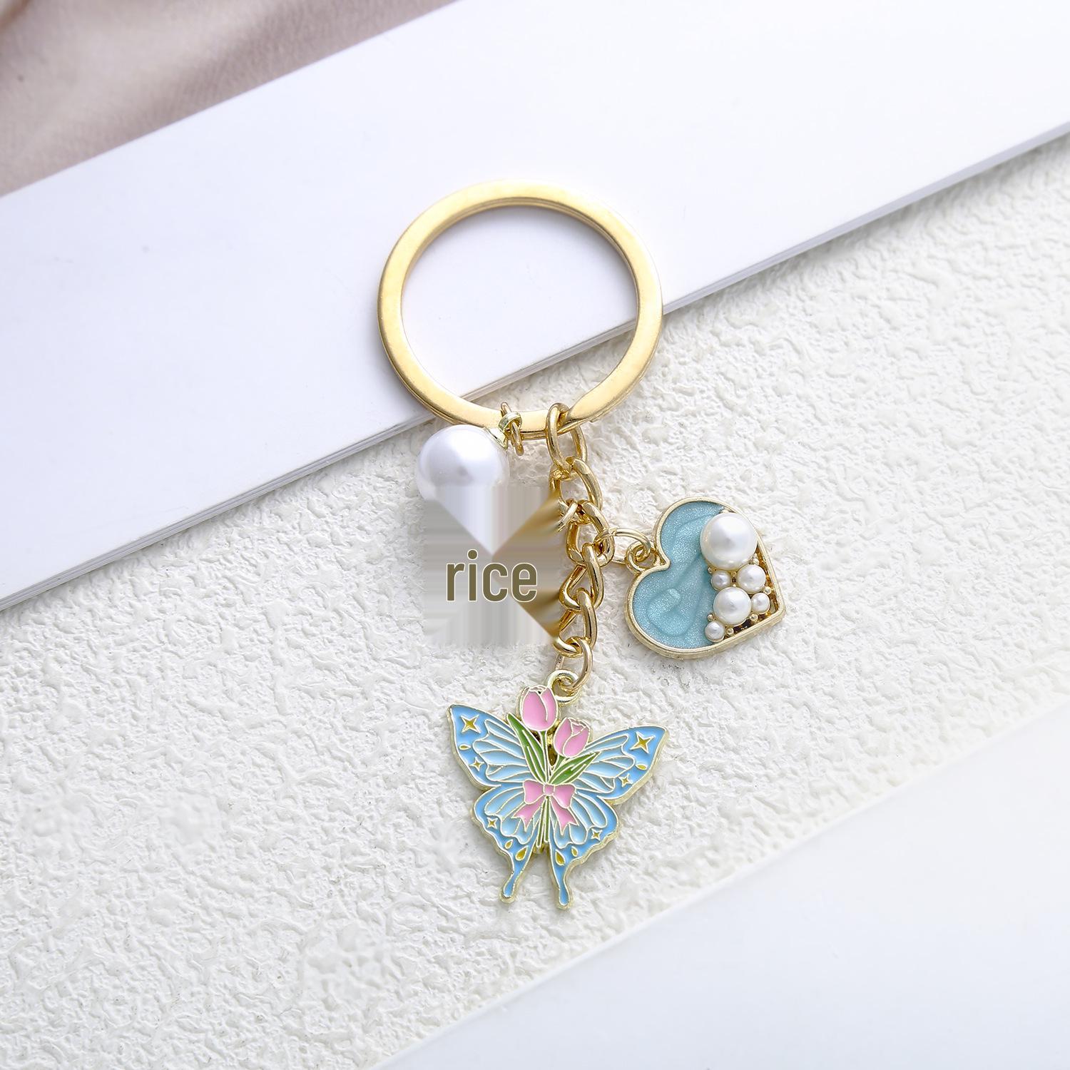 Lake Blue Butterfly Heart Pendant Keychain: Elegant Summer Accessory