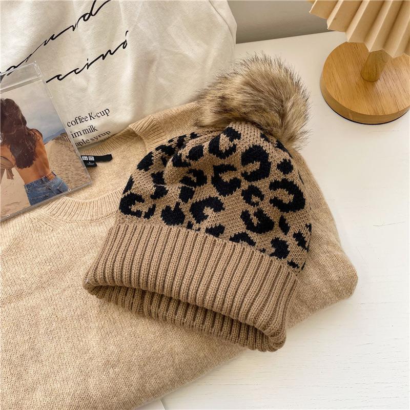 Hat women's new autumn and winter versatile Korean version leopard print hairball wool hat fashionable warm crimping knitted pullover hat tide