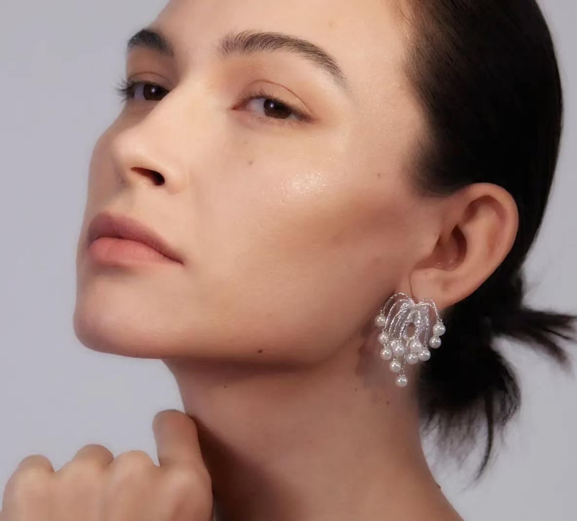 

Жемчужные серьги, вдохновленные звездами: Модный, Высококлассный, Легкая Роскошь с Изысканным Прикосновением серебряный