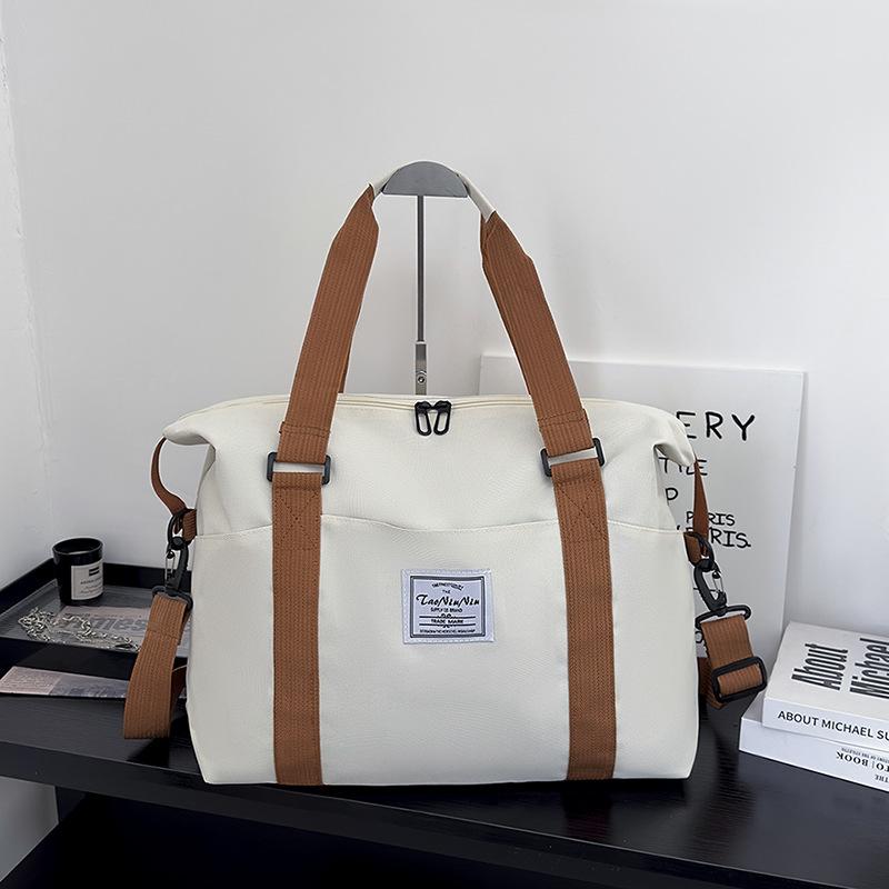 Travel bags for women and men, short-distance luggage storage, large-capacity business travel light travel bags, leisure new portable messenger bags