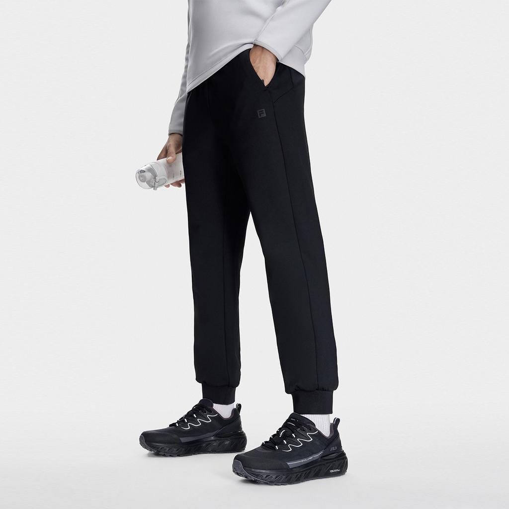 FILA Solid Color Elastic Cuffed Knitted Sports Pants Men bottoms Deep-Black A11M341605F-BK