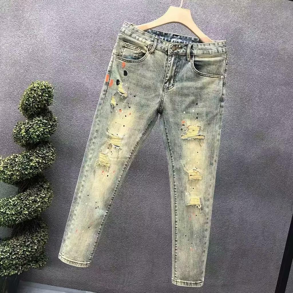 Ruffian handsome hole splashing ink light-colored thin jeans men's Korean version slim-fitting nine-point pants new men's pants