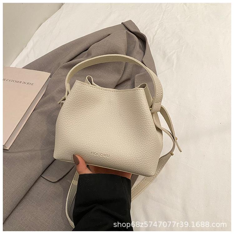 Fashion design hand-held small bag bag women's 2025 new retro versatile bucket bag women's commuter shoulder crossbody bag