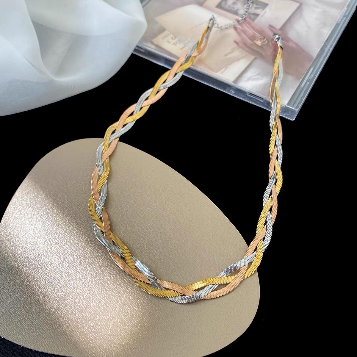 

Премиальный браслет и ожерелье из титановой стали с перекрестным плетением - Ретро модный аксессуар