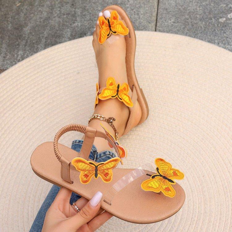 Damen Sommer Sandalen mit flacher Sohle Zehen bedeckend dreidimensionale Schmetterlingsstickerei elastischer Knöchelriemen Sandalen 2025 direkt gelb Erwachsene