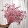 An artificial butterfly branch used for weddings, family offices, parties, decorating vases, and floral arrangements