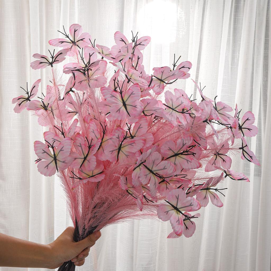 An artificial butterfly branch used for weddings, family offices, parties, decorating vases, and floral arrangements