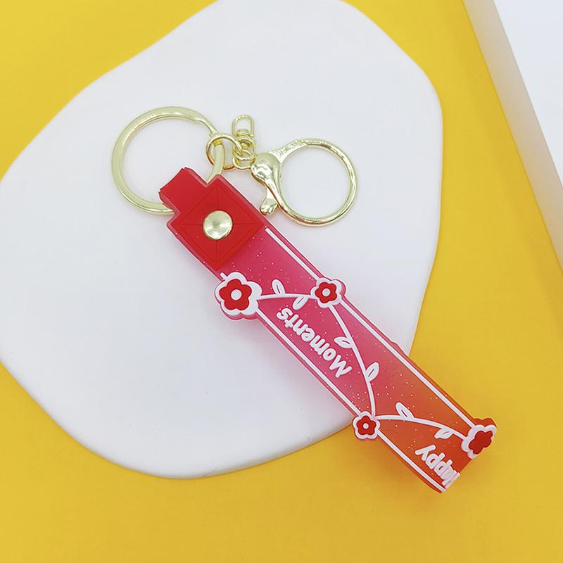 Transparent Pvc Soft Rubber Rope Keychain English Small Flower Jelly Color Plum Blossom Candy Color Drop Adhesive Wristband