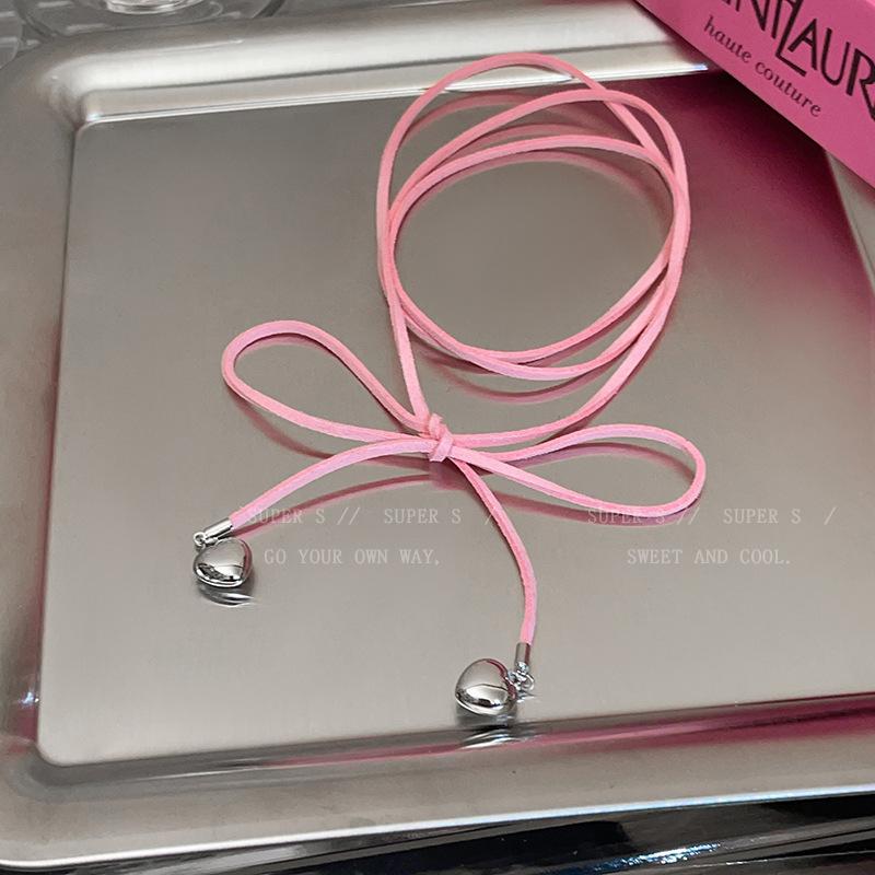 

Korean long black bow ribbon love necklace women s niche in wind sweater chain