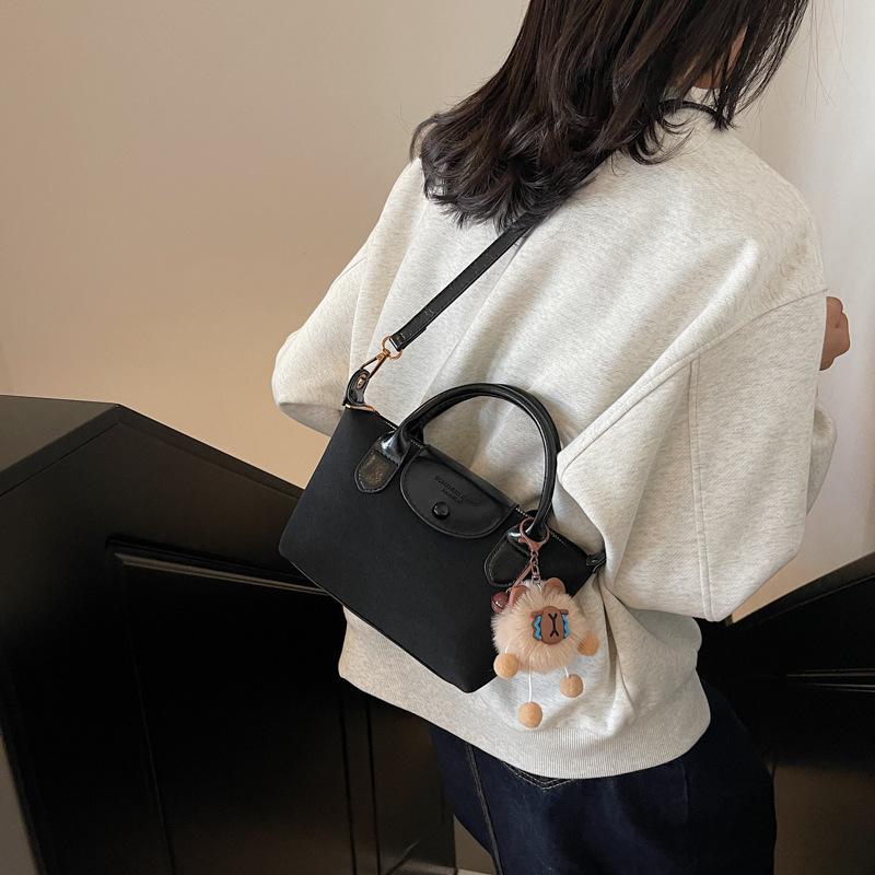 

Модные женские сумки 2025 новые трендовые женские сумки высокого класса универсальные сумки-мессенджеры модные женские сумки сумки-пельмени 23*8*14