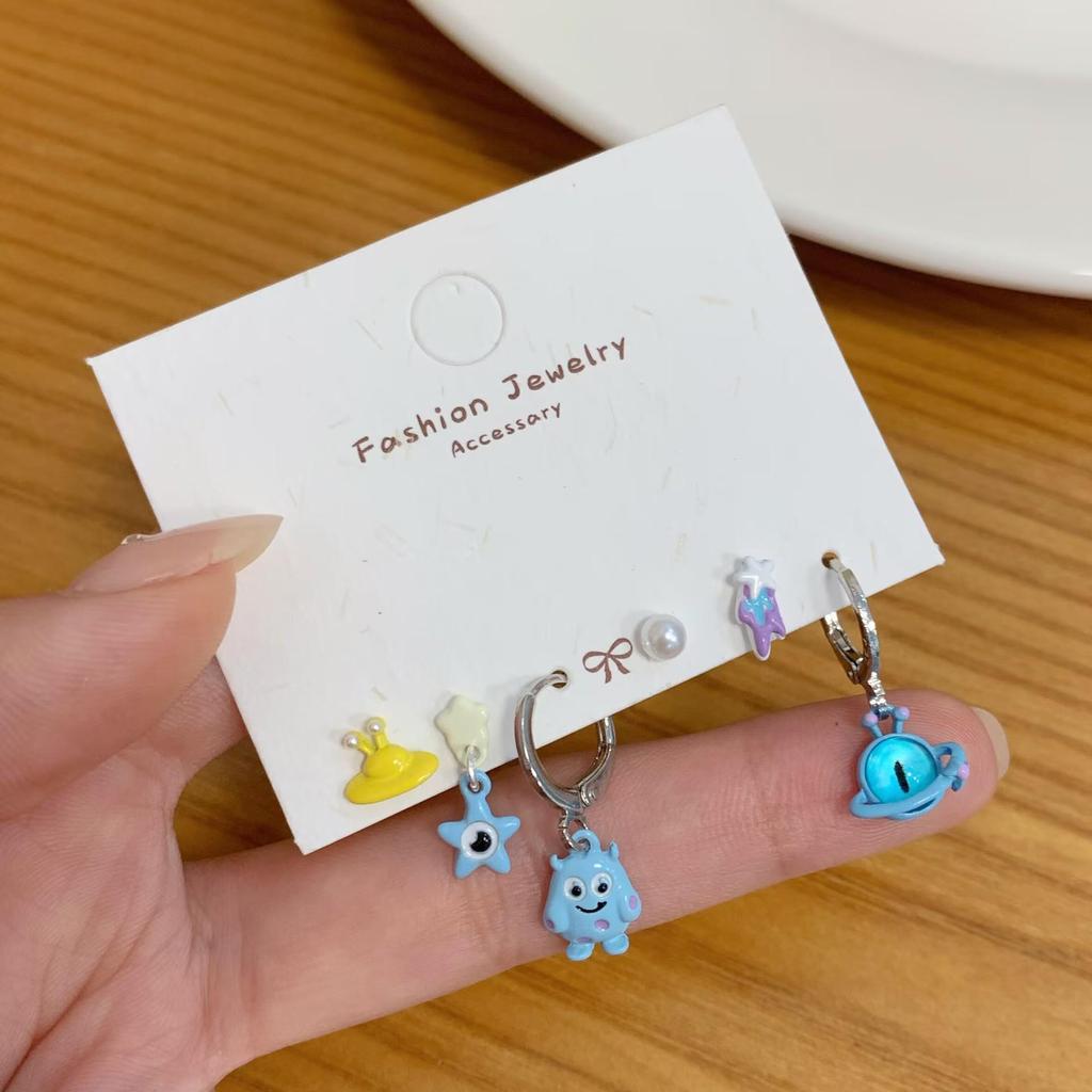 Cute Silver Needle Blue Monster Earrings Set: Asymmetrical Childlike Design with Exquisite Cat's Eye Stone.