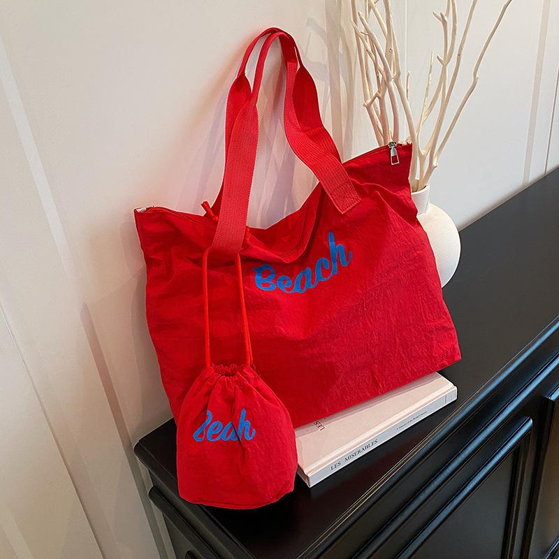 

Lazy wind printed shoulder bag Korean candy color large capacity tote bag women s canvas bag cloth bag underarm handbag красный