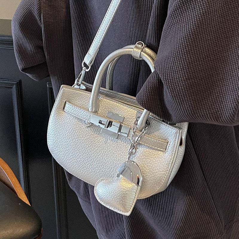 Wholesale Temperament Versatile High Sense Lychee Pattern Hand Carrying Bucket Bag Fashionable Foreign Style Messenger Platinum Bag Women