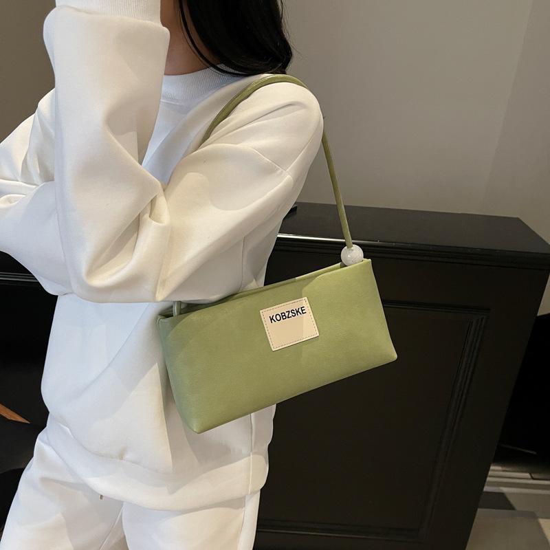 Korean version of hand-carried small square bag spring and summer new niche fashion shoulder bag 2025 commuter shoulder underarm bag