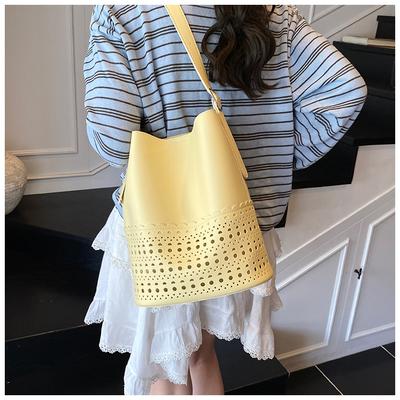 Nischendesign Textur schlichte Mode hohle Tragetasche neue Mode vielseitige Eimer-Schultertasche