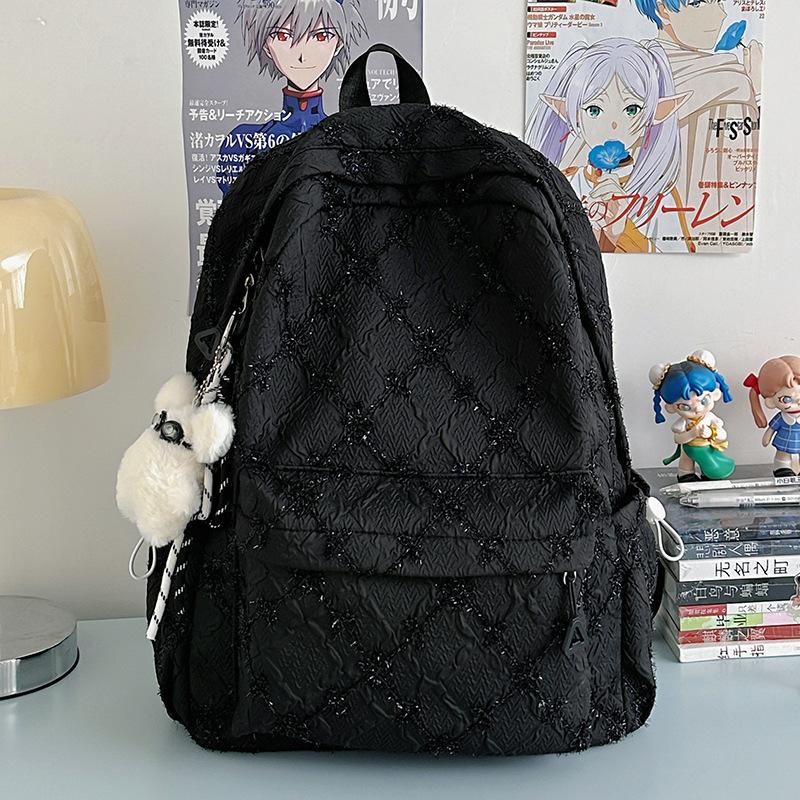 2025 new high-value travel lightweight junior high school student backpack women's large-capacity literary and versatile schoolbag