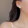 Light Luxury Retro Woven Pearl Stud Earrings Exquisite Design Sense Winding Niche Versatile Daily Commuter Earrings