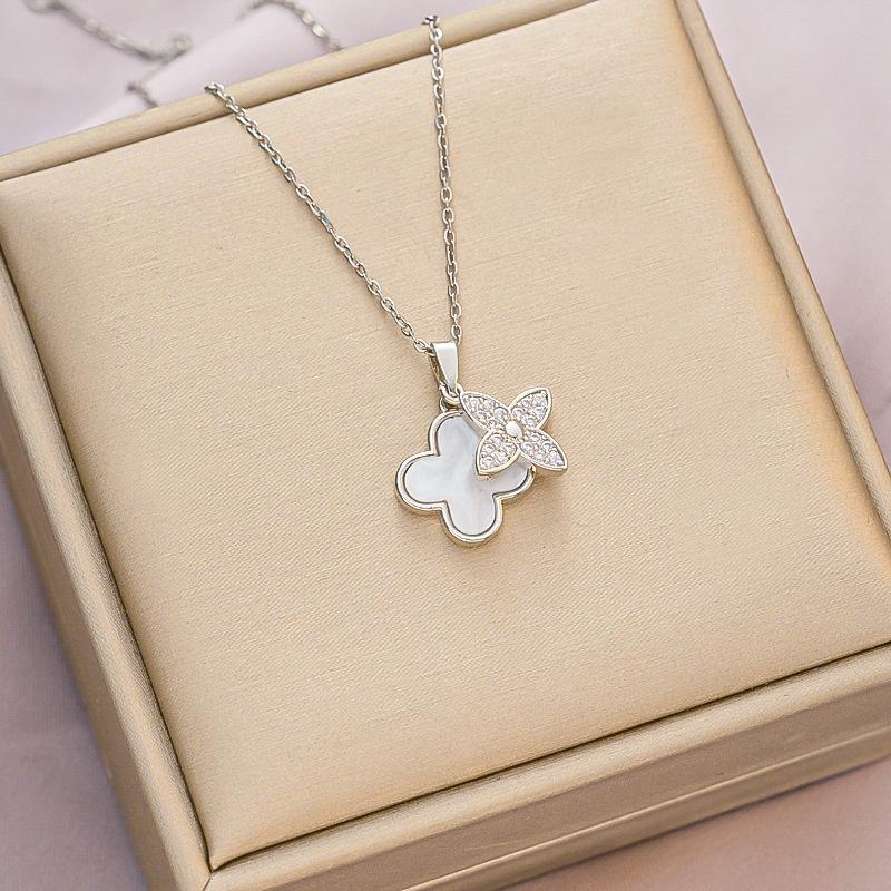 

Ожерелье из четырехлистного клевера из черного и белого перламутра, роскошный и изысканный универсальный аксессуар