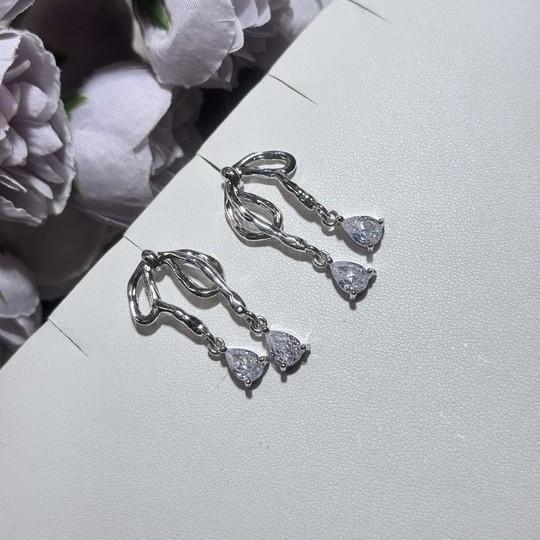 Cold wind metal liquid bow zircon ear buckle female sweet and cute elegant personalized fashion earrings ear jewelry