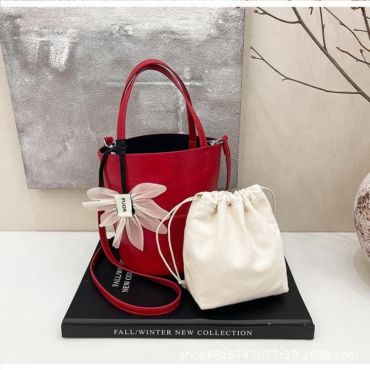 Japan and South Korea Retro Versatile Bucket Bag Women's 2025 Summer Fashion Simple Mini Commuter Shoulder Messenger Bag