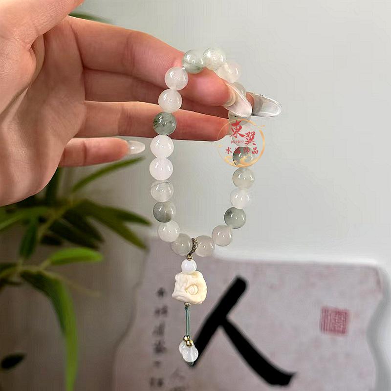 Tianshan Jade Round Bead Bracelet with Ivory Nut and Waking Lion Charm
