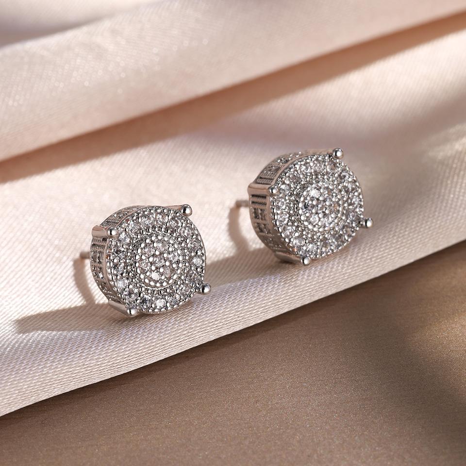 ZAKOL Gold Kupfer Farbe Iced Out Runde Ohrstecker für Damen/Herren Klarer Zirkonia Hip Hop Trend Piercing Ohrschmuck Großhandel