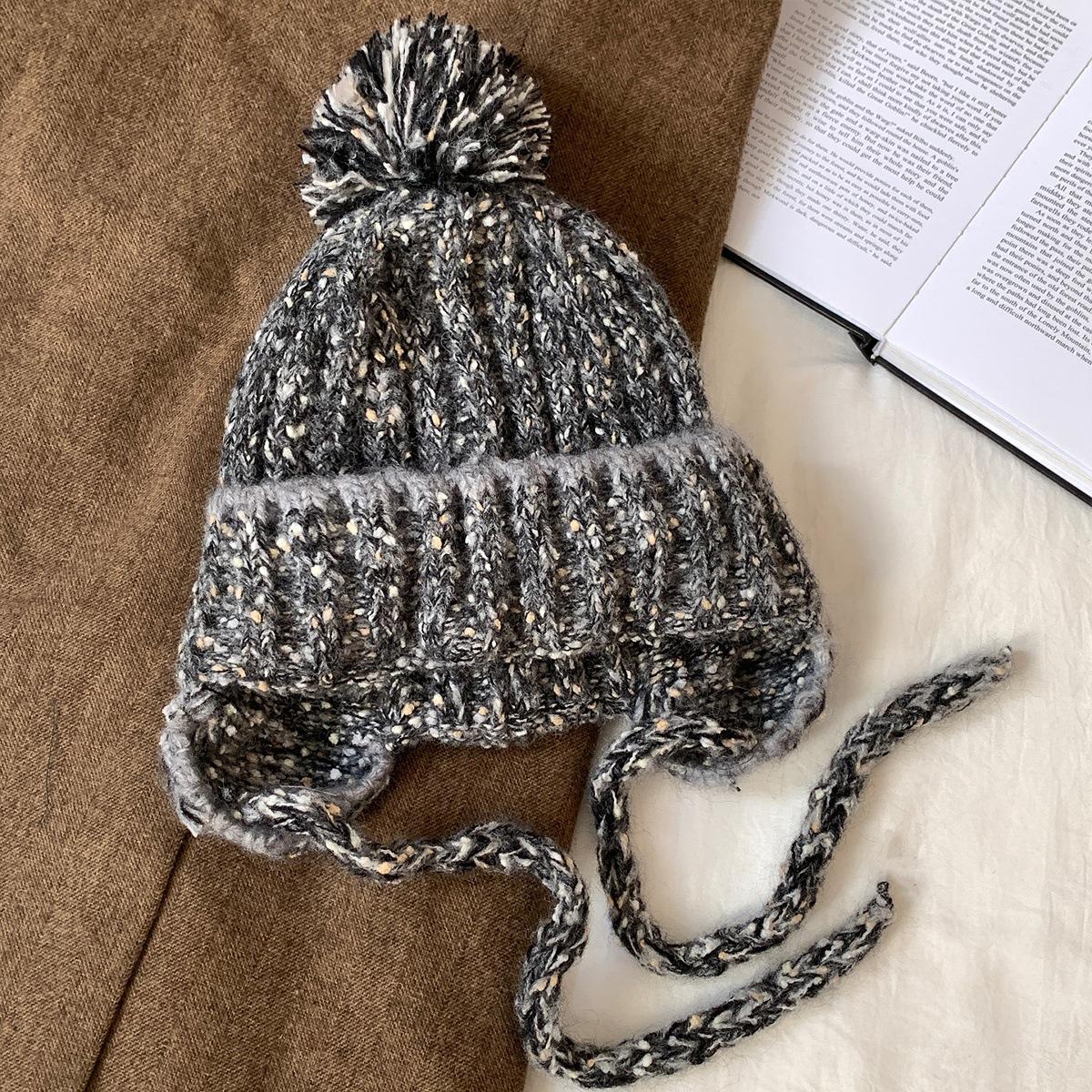 

Mixed color hairball knitted wool hat women s season warm big head circumference pullover hat showing small face cold ear protection hat M（56-58cm） чорний