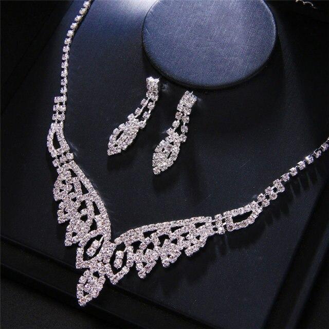 

Розкішні весільні намиста з цирконієм. Жіночі комплекти весільних прикрас. Цирконі. Прикраси. Кришталі. Срібні кольорові сережки.