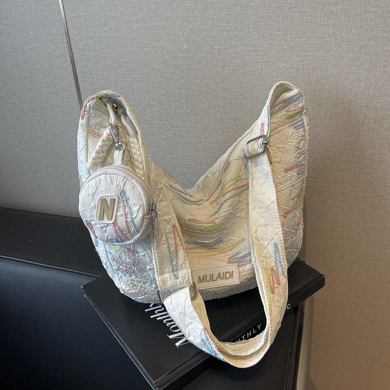 Summer casual niche dumpling girl 2025 new large-capacity fashion messenger bag lightweight shoulder bag